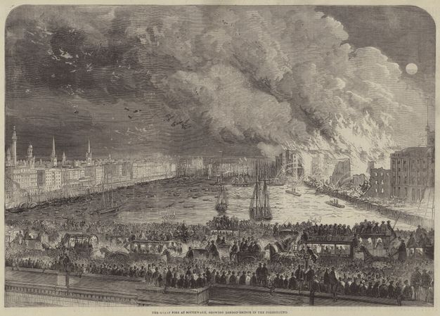 Print. Countless people line a bridge to watch burning buildings on a riverbank to our right. Smoke pours into the sky.